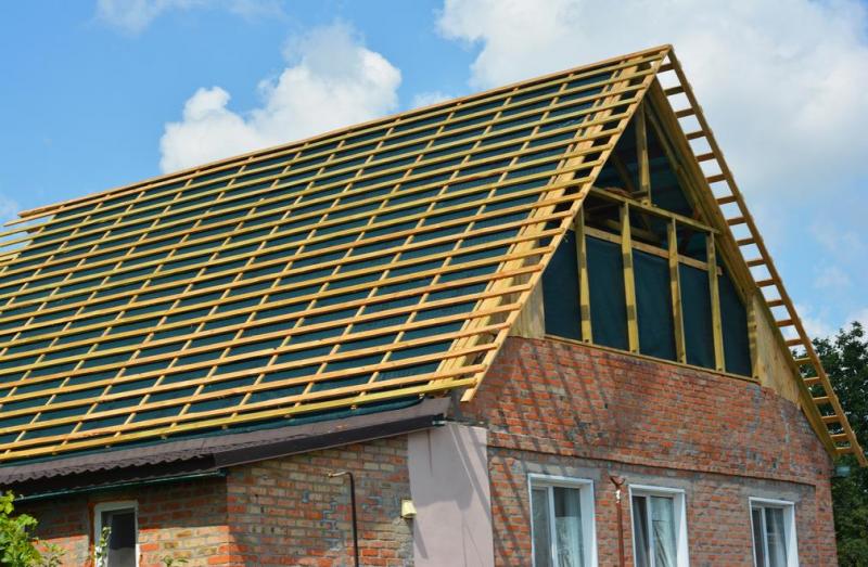 Pose de tuiles : quelles techniques pour une toiture durable ?